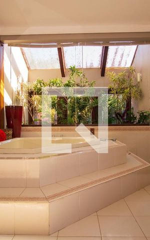 Casa de condomínio à venda com 1400m², 1 quarto e 4 vagasBanheiro da Suíte 2