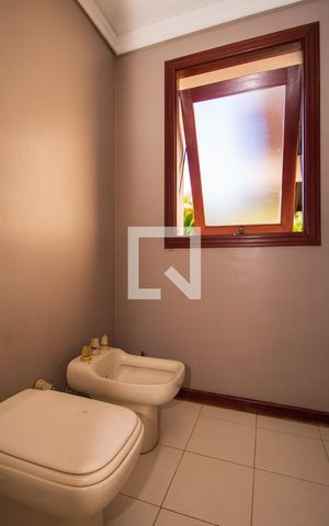Casa de condomínio à venda com 1400m², 1 quarto e 4 vagasBanheiro da Suíte 2