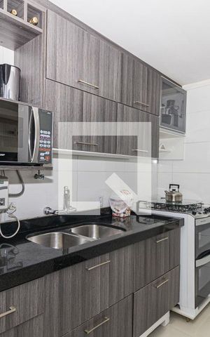Apartamento à venda com 64m², 2 quartos e 1 vagaCozinha e Área de Serviço