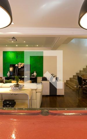 Casa de condomínio à venda com 600m², 3 quartos e 4 vagas Casa de condomínio à venda com 600m², 3 quartos e 4 vagasSala 1