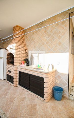 Casa à venda com 415m², 4 quartos e 6 vagaschurrasqueira