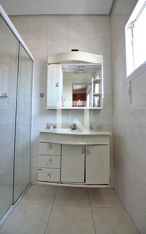 Casa à venda com 413m², 4 quartos e 3 vagasBanheiro do Quarto 1 - Suíte