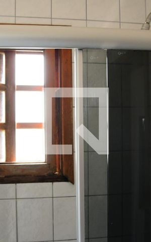 Casa de condomínio para alugar com 380m², 4 quartos e 4 vagasBanheiro da Suíte 1