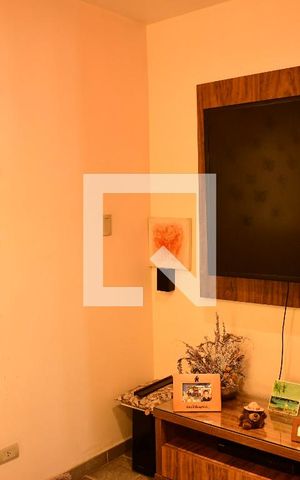 Casa de condomínio para alugar com 380m², 4 quartos e 4 vagasSala de TV