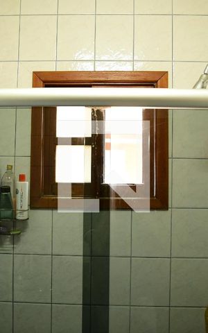 Casa de condomínio para alugar com 380m², 4 quartos e 4 vagasBanheiro da Suíte 2