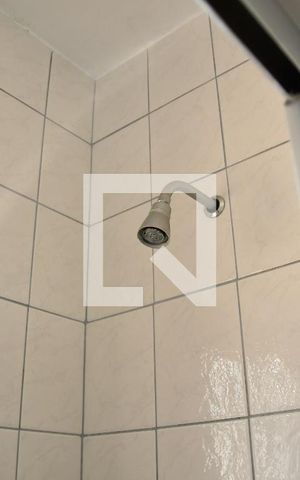 Casa de condomínio para alugar com 380m², 4 quartos e 4 vagasBanheiro da Suíte 1