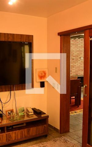 Casa de condomínio para alugar com 380m², 4 quartos e 4 vagasSala de TV