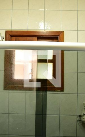 Casa de condomínio para alugar com 380m², 4 quartos e 4 vagasBanheiro da Suíte 3