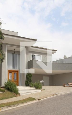 Casa de condomínio para alugar com 450m², 4 quartos e 5 vagasFachada