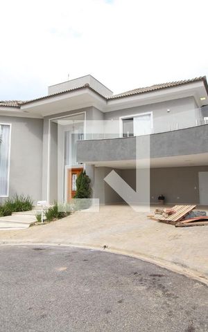 Casa de condomínio para alugar com 450m², 4 quartos e 5 vagasFachada