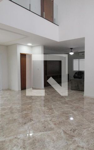 Casa de condomínio para alugar com 450m², 4 quartos e 5 vagasSala