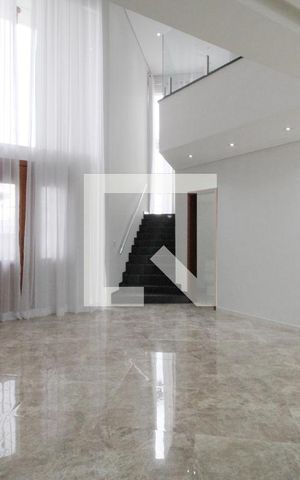 Casa de condomínio para alugar com 450m², 4 quartos e 5 vagasSala