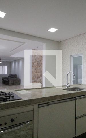 Casa de condomínio para alugar com 450m², 4 quartos e 5 vagasCozinha