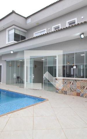 Casa de condomínio para alugar com 450m², 4 quartos e 5 vagasÁrea Externa
