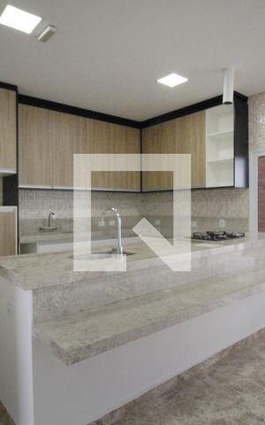 Casa de condomínio para alugar com 450m², 4 quartos e 5 vagasCozinha