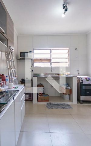 Casa à venda com 561m², 5 quartos e 4 vagas Casa à venda com 561m², 5 quartos e 4 vagasCozinha