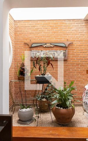 Casa à venda com 420m², 3 quartos e 4 vagas Casa à venda com 420m², 3 quartos e 4 vagasSala de Estar