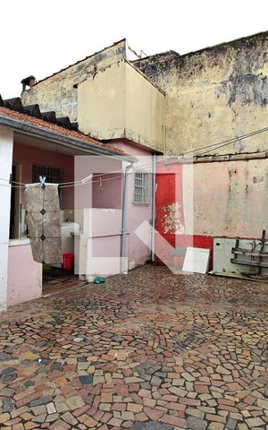 Casa à venda com 340m², 4 quartos e 1 vagaÁrea de Serviço 2 / Quintal