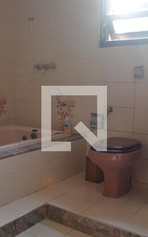 Casa à venda com 350m², 3 quartos e 4 vagasBanheiro da Suíte 3