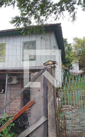 Casa à venda com 224m², 3 quartos e 3 vagasFachada 