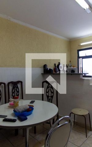 Casa à venda com 118m², 2 quartos e 2 vagas Casa à venda com 118m², 2 quartos e 2 vagasCozinha