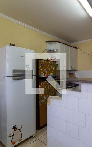 Casa à venda com 118m², 2 quartos e 2 vagas Casa à venda com 118m², 2 quartos e 2 vagasCozinha