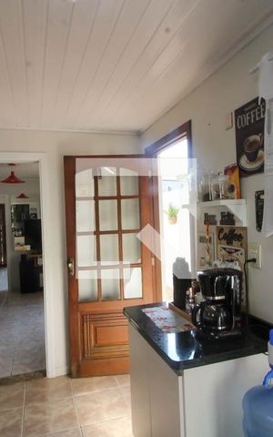 Casa à venda com 280m², 4 quartos e 4 vagas Casa à venda com 280m², 4 quartos e 4 vagasCozinha