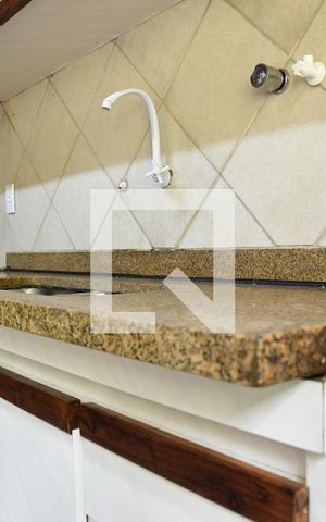 Casa de condomínio para alugar com 280m², 4 quartos e 4 vagasCozinha