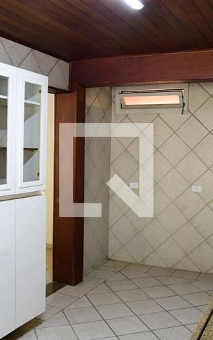 Casa de condomínio para alugar com 280m², 4 quartos e 4 vagasCozinha
