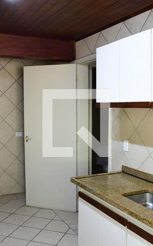 Casa de condomínio para alugar com 280m², 4 quartos e 4 vagasCozinha
