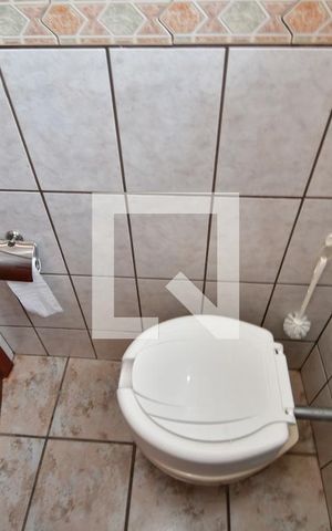 Casa à venda com 340m², 4 quartos e 2 vagasBanheiro de serviço