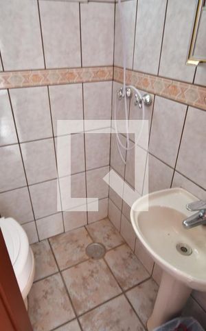 Casa à venda com 340m², 4 quartos e 2 vagasBanheiro de serviço
