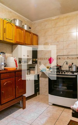 Casa à venda com 90m², 2 quartos e 2 vagas Casa à venda com 90m², 2 quartos e 2 vagasCozinha