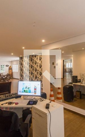 Casa de condomínio à venda com 420m², 7 quartos e 4 vagasSala de Estar