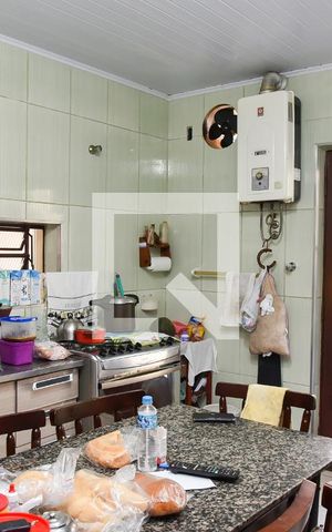 Casa à venda com 280m², 5 quartos e 1 vaga Casa à venda com 280m², 5 quartos e 1 vagaCozinha