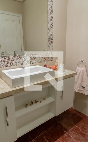 Casa à venda com 409m², 4 quartos e 2 vagasBanheiro 3