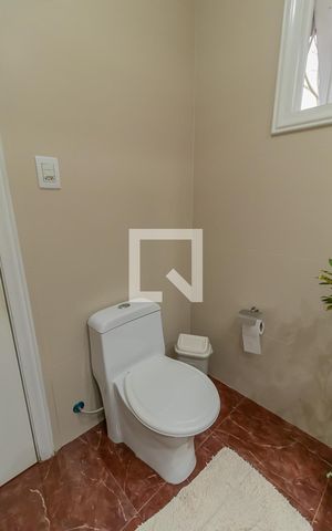Casa à venda com 409m², 4 quartos e 2 vagasBanheiro 3