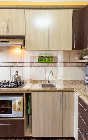 Apartamento à venda com 52m², 2 quartos e 1 vaga Apartamento à venda com 52m², 2 quartos e 1 vagaCozinha e Área de Serviço