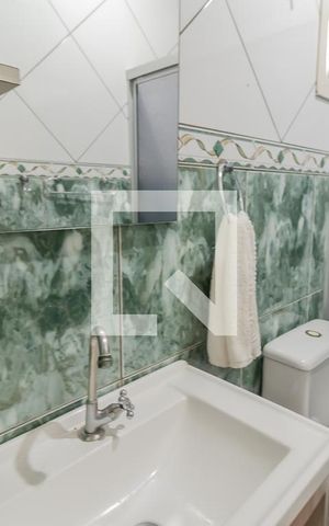 Casa à venda com 98m², 3 quartos e 2 vagasBanheiro do Quarto 1