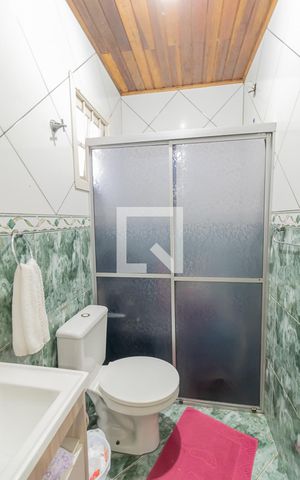 Casa à venda com 98m², 3 quartos e 2 vagasBanheiro do Quarto 1
