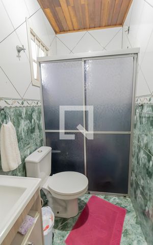 Casa à venda com 98m², 3 quartos e 2 vagasBanheiro do Quarto 1