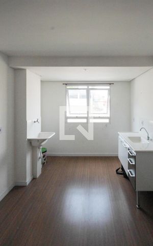 Studio à venda com 26m², 1 quarto e sem vaga Studio à venda com 26m², 1 quarto e sem vagaCozinha e Área de Serviço