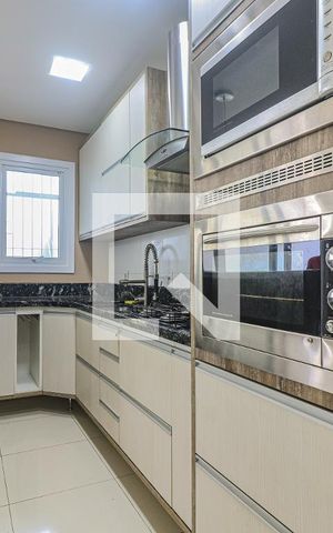 Casa à venda com 120m², 3 quartos e 2 vagas Casa à venda com 120m², 3 quartos e 2 vagasCozinha