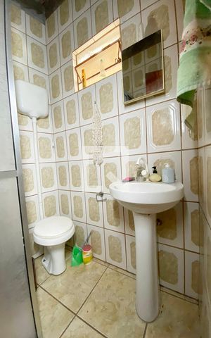 Casa à venda com 180m², 3 quartos e 3 vagasBanheiro de Serviço