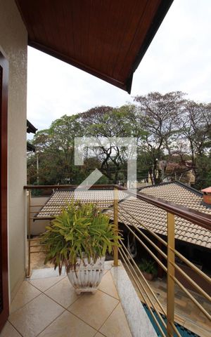 Casa à venda com 411m², 4 quartos e 5 vagasQuarto 3 (suíte) - Sacada
