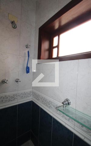 Casa à venda com 411m², 4 quartos e 5 vagasBanheiro da Suíte 2