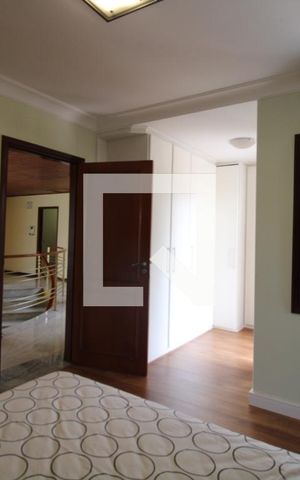 Casa à venda com 411m², 4 quartos e 5 vagasQuarto 3 (suíte)