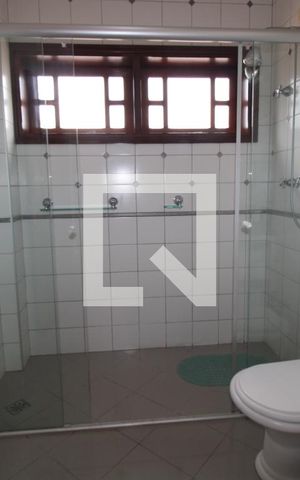 Casa à venda com 411m², 4 quartos e 5 vagasBanheiro da Suíte 3