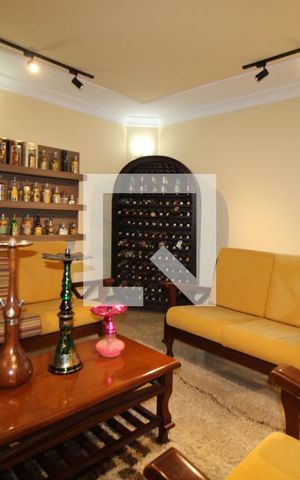 Casa à venda com 411m², 4 quartos e 5 vagasSala de estar