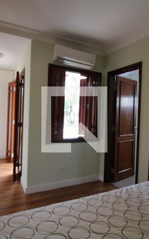 Casa à venda com 411m², 4 quartos e 5 vagasQuarto 3 (suíte)